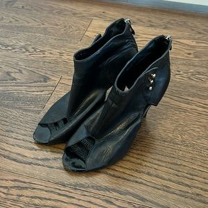 Shows with open front toes. Size 8